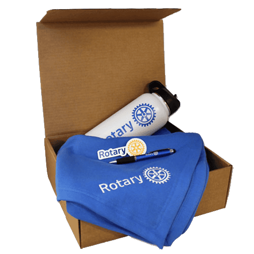 A box with various Rotary merchandise.