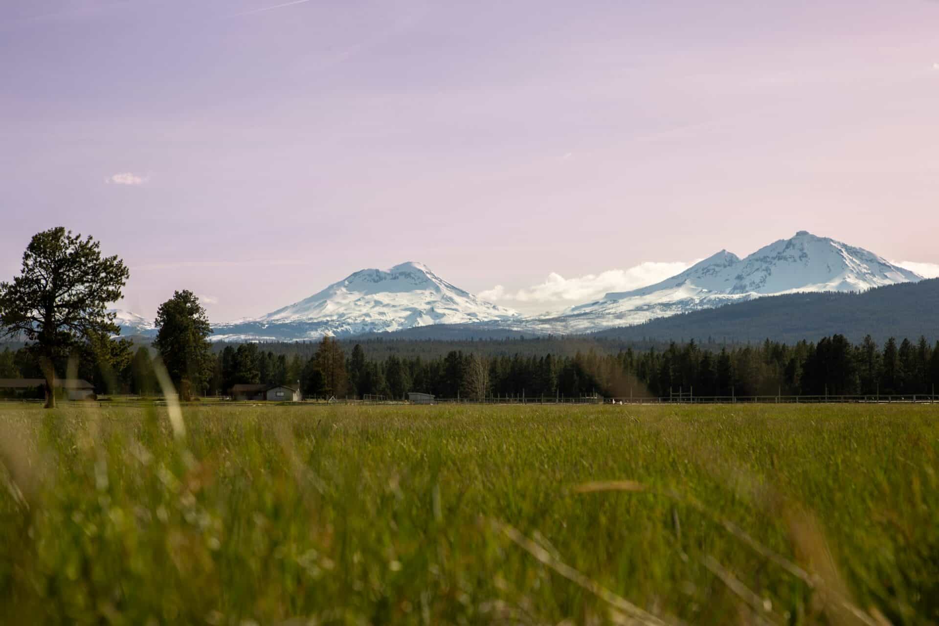 Photo of snow-covered Sisters mountains in Sisters, OR